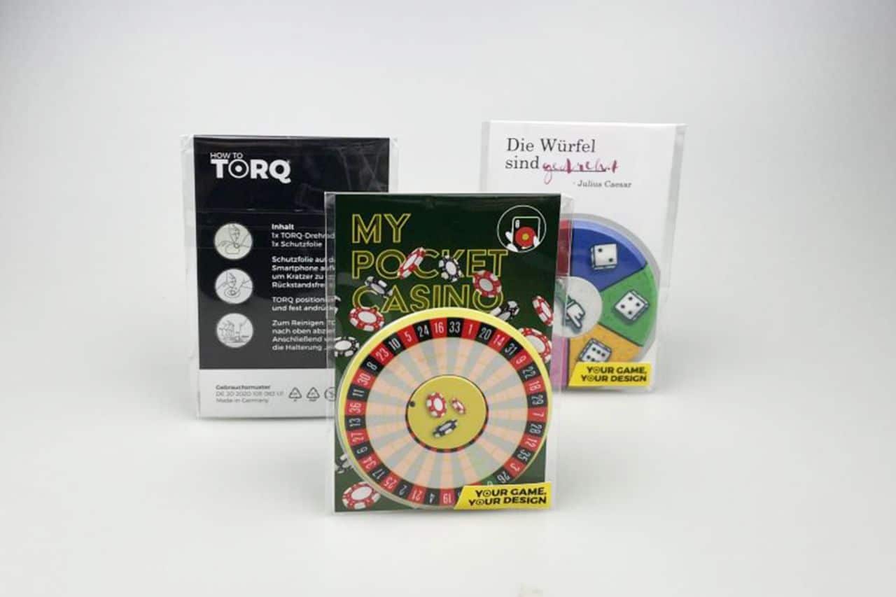 TORQ - Analogue games for smartphones: Design samples with carrier card and polybag